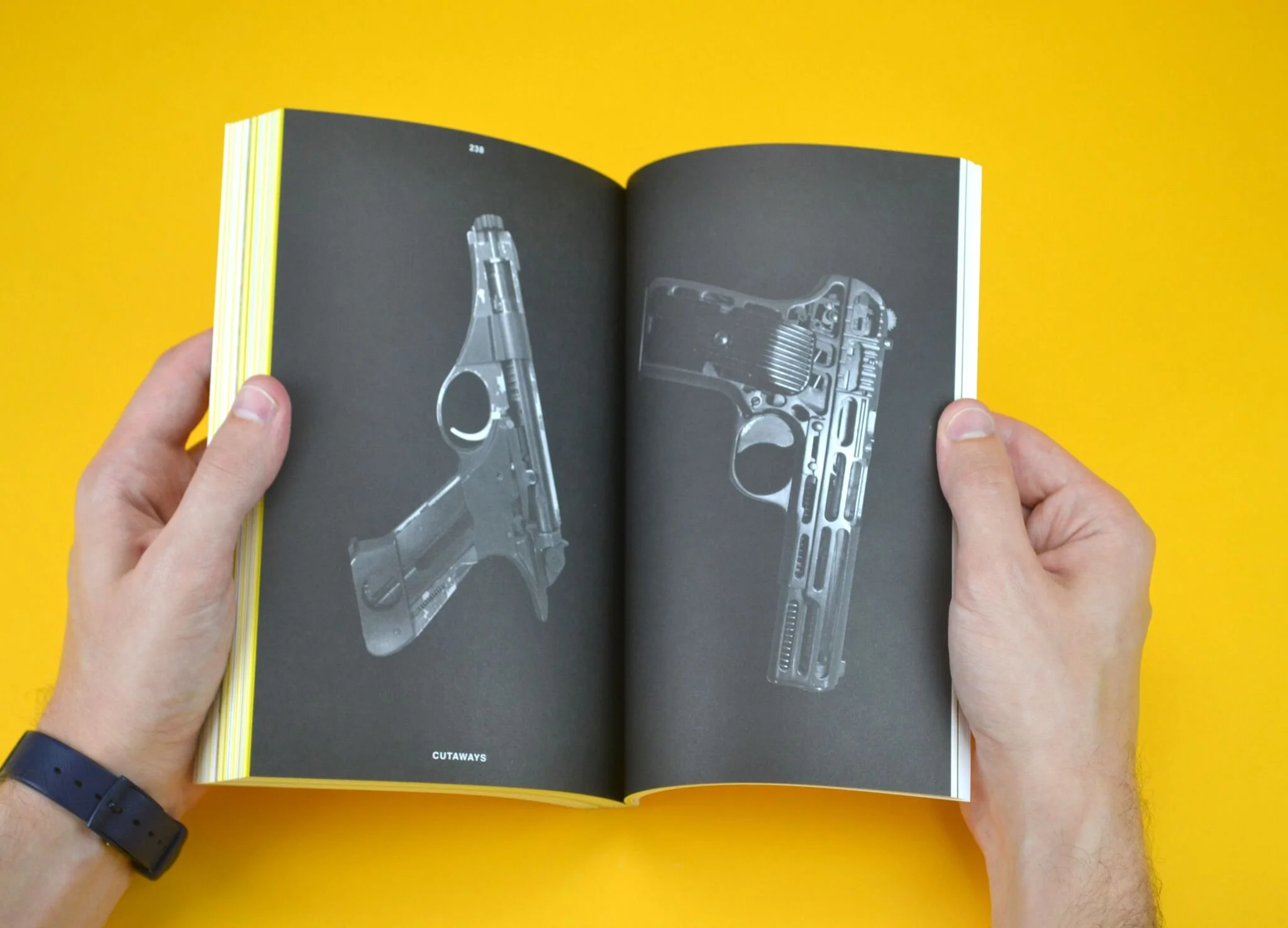 CLOG Guns issue interior spread with black and white firearm component photography
